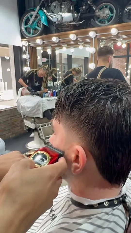 Detail work around the ear with clippers