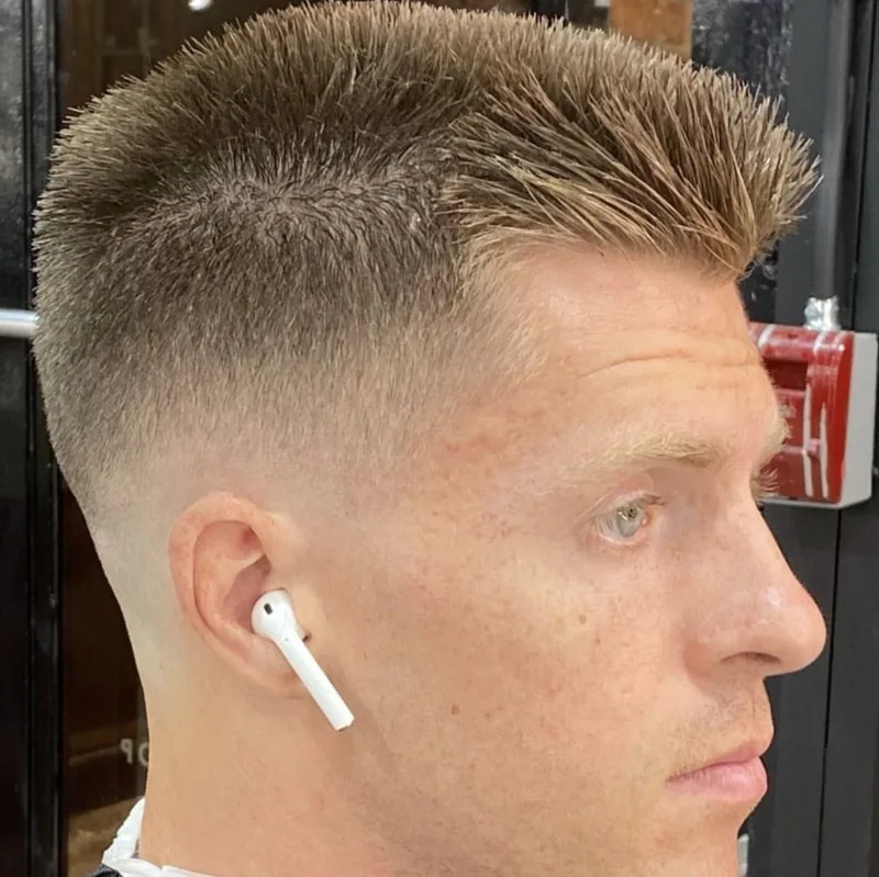 A high textured crop finished with a clean skin fade at the temple